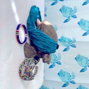 African beaded jewelry.  Only worn a few times. Necklace and 2 bracelet.